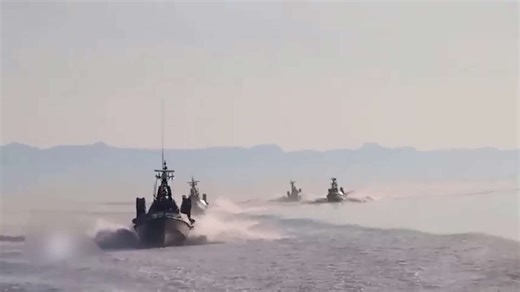 Iranian fast attack boats execute coordinated approach on well-defended warship