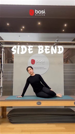 BASIPilates_asia on Instagram: "The Side Bend is more than just a simple lateral crunch. It is a movement that builds a solid lateral line by grounding through the floor and finding diagonal alignment through the spine. As we gear up for the BASI Mat Challenge starting this March, this is one of the most elegant yet powerful movements we will encounter on the mat. Feel the long, continuous connection through your side body within a stable, unwavering alignment. ✨ 💫 Setting Keep both sides of th