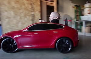 Watch Verne Troyer Rip Wheels In A Battery-Powered Tesla Model S Built For Kids