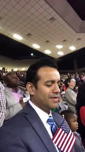 Pastor Garrett Booth and Our Spanish Pastor David Scarpeta singing the Star Spangled Banner as Pastor David became an American Citizenship Ceremony this morning! | Grace Church Houston