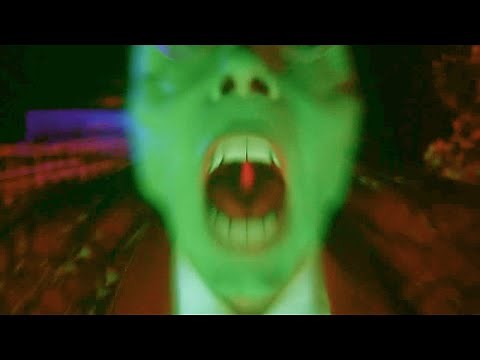 The Mask smashes animated alarm clock with a giant hammer. Scene The Mask 1994