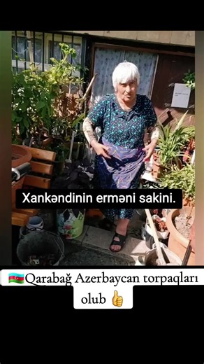 Elderly Woman Shares Stories in a Beautiful Garden