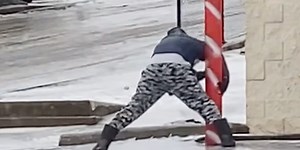 Watch: People slip, vehicles slide down frozen hill after Oregon ice storm