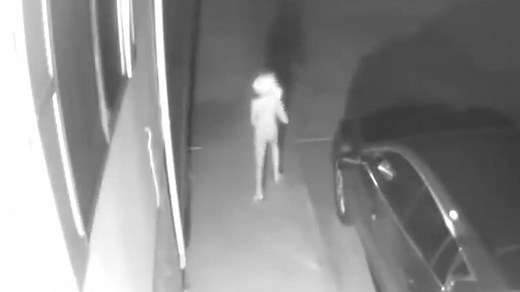 Alien Caught on Camera (News Report) Mysterious late night visitor. from another world