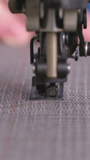 clip-3980585601-industrial-sewing-machine-presser-foot-processes-pinstriped