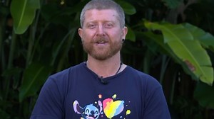 Queensland man 'bitch slapped' in the face by python