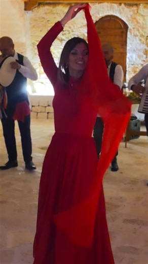 Urban Milan Magazine on Instagram: "In Puglia, traditional dance is centered on the Pizzica, a form of the Tarantella. Originating as a ritual to cure the supposed effects of a tarantula bite, it later became a popular social dance performed at gatherings, weddings, and festivals. Characterized by fast rhythms, hand clapping, and tambourine accompaniment, the Pizzica reflects the region’s deep connection to music, community, and cultural heritage. #PugliaCulture #ItalianFolkDance #Pizzica #Taran