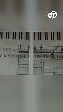Crews begin work to remove President Trump's name from the Kennedy Center