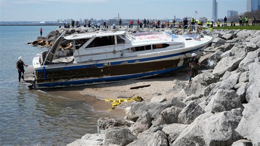 Watch the salvage crew drag abandoned boat Deep Thought on to land