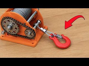 Brilliant invention by a welder! He built a pulley using salvaged gears.