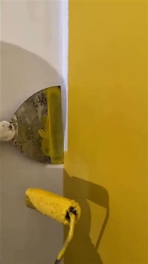 The process of painting wall edges carefully, creating clean lines and a neat professional finish