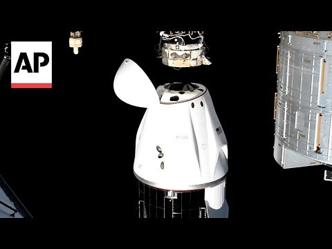 Stranded NASA astronauts board SpaceX capsule to return to Earth