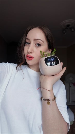 Mariam Khvedelidze🎀 on Instagram: "Meet @ivy.plantsio.official — the cutest little smart planter you’ve ever seen 🌿💚 She doesn’t just hold your plant — she feels what it needs. Too thirsty? Too cold? Not enough light? Ivy shows it all with adorable facial expressions 🥺🌞💧 Connect her to the app, choose your plant, and she takes care of the rest. And yes… she reacts when you touch her leaves 👋🍃 It’s like having a tiny green pet on your desk — one that actually tells you how it feels 🪴✨ Pr