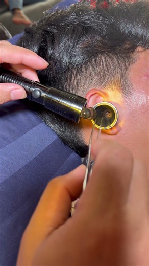 Cleaning removal ear wax ASMR