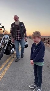 The bridge was abandoned. The night was quiet. Most riders would have kept going. But one biker shut off his engine when he saw a small figure trembling at the edge. No shouting. No warning signs. Just a moment that could have gone very wrong. He stepped down instead of riding past—and everything changed after that. (Full story in the comments ⬇️) | Amazing World