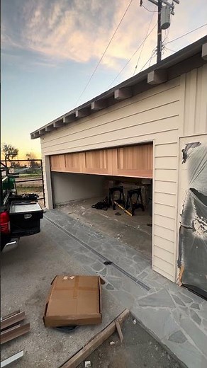 Custom, wood garage door and LiftMaster motor installed in Pacific Palisades