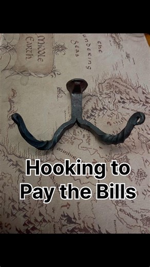 Forging a coat hook from a rail road spike #rootsandanvil #blacksmithing #railroad spike