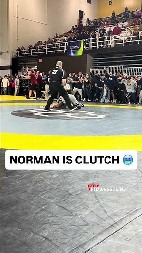 #15 Barry Norman secures the overtime takedown over #16 Lucas Boe