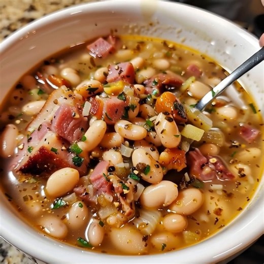 WOULD YOU EAT THIS WHITE BEAN AND HAM HOCK SOUP !? Ingredients: A medium package. Of dried Northern beans, I used the 16-ounces sizes. 3 to 4 Meaty-ham hock shank, sometimes, I used also meaty ham bone about. 1 small diced white Onion. Enough water to cover the beans. Salt & pepper, to taste 1/3 Cup.Of Light brown sugar. DIRECTIONS: Step1: The first step I started with, was to sort the beans for pebbles, and then I cleaned them under cold water. Step2: In the crockpot, I combined the rinsed bean