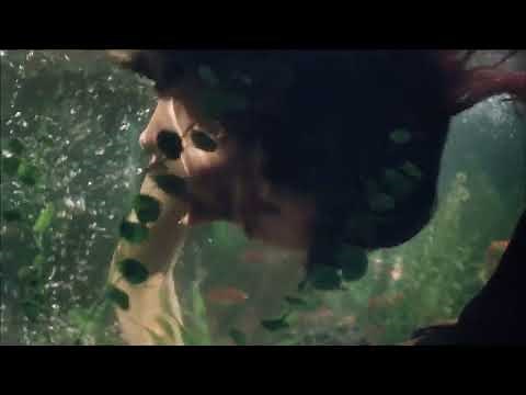 Beautiful Women is Drowned in Aquarium