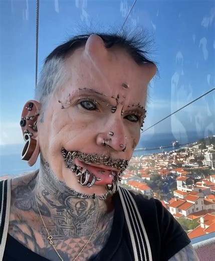 17K views · 87 reactions | This man has over 560 piercings on his body, which earned him a world record  In addition to the piercings, he has horn-shaped implants in his forehead and his body is almost entirely covered in tattoos  But the most fascinating part is that he used to be a regular office worker, and he got his first piercing at the age of 40  How this man looked before all these transformations was shown in the first comment  | Pets Time | Facebook