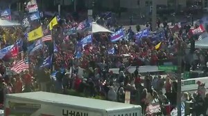 SUPPORTERS OF President Trump packed Freedom Square in Washington, D.C. to protest the election results on Saturday. They chanted "USA, USA" and "Four More Years” before marching toward the Supreme Court. President Trump surprised them by having his motoracde drive by the crowd. | WDRB News