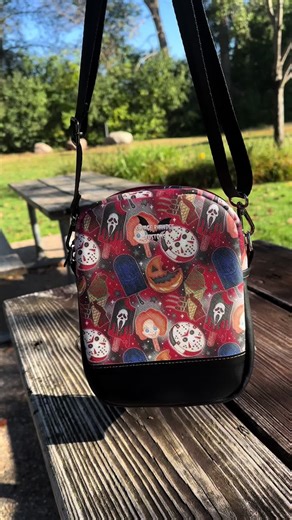 I love these simple convertible bags. They can be a crossbody, sling or mini backpack! The horror ice creams art is from @The Citrine Cauldron 🖤 #halloween #spookyseason #alt #fyp #horror