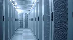High-tech server rooms showcase rows of modern servers housed in sleek cabinets. The environment highlights efficient cooling systems and impressive data management capabilities. | Premium Stock Video Footage