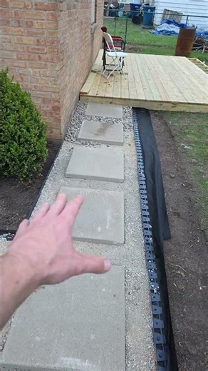24x24 paver walk way with river rock