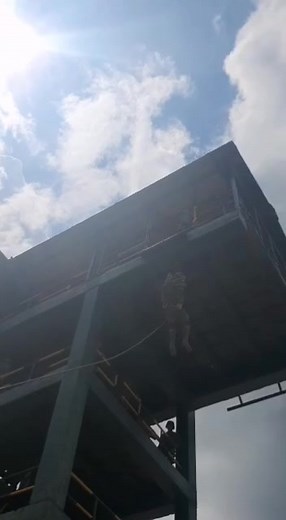Soldiers Training: Rappelling Drill in Military Exercise
