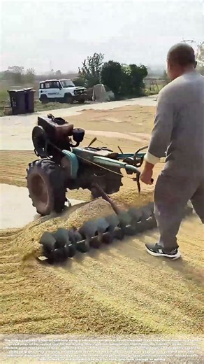 Harnessing Horsepower: The Tractor-Mounted Grain Spreader