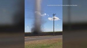 26K views · 49 reactions | Holy moly, look at this! A giant dust devil swirls in Queensland, Australia. You can hear how excited the kids are to see something this spectacular! | America's Morning Headquarters | Facebook