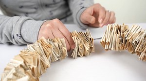 1.4K views · 13 shares | Grab an old book or your favorite scrapbook paper and make this adorable folded paper wreath! So easy to make and beautiful! Tutorial here --> https://www.diyncrafts.com/90775/decor/rustic-folded-book-page-wreath-with-video-tutorial | DIY and Crafts - Diyncrafts.com | Facebook