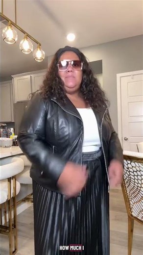 This plus size long, black satin pleated skirt is everything! I did not realize I would love it so