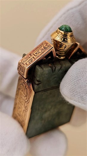 The "Jade Stone & Gold" Striker lighter by Unknown [1920-40s]
