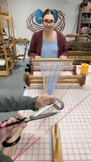 Cutting threads on my log cabin loom setup #textileart #weaving #diy