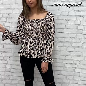 4.7K views · 55 reactions | The Ruby Top - pretty, cute, easy, and actually seriously just really cute. We LOVE this Leopard print, and the top itself is gorgeous. Off the shoulder, but can still be worn on the shoulder of course. Long sleeves which also look really nice pulled up, the sleeves are really nice as is though - look at them :) Shop HERE: https://www.vineapparel.com/products/ruby-top?_pos=1&_psq=ruby&_ss=e&_v=1.0 | Vine Apparel | Facebook