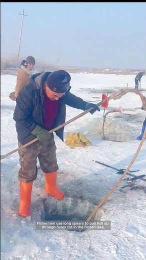 Ice Fishing with Traditional Spears on a Frozen Lake