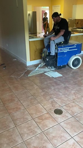 Dexter's Tile Demolition with a Powerful Machine