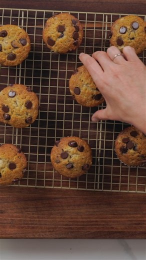 These delicious banana chocolate chip muffins take less than 30 minutes to whip up! Recipe: https://natashaskitchen.com/banana-muffins-recipe/ | NatashasKitchen.com