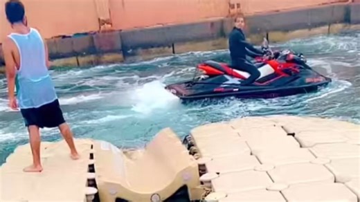 Boy gets unexpectedly drenched as water bike starts its splashing journey