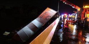 Semitruck slides off interstate into canal