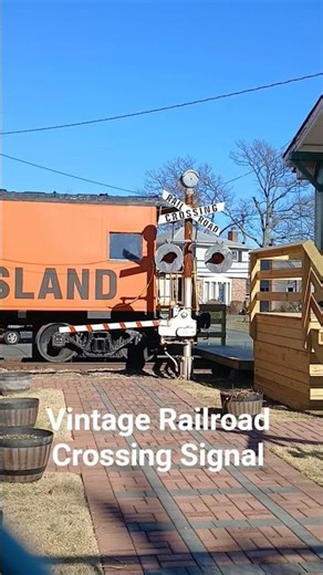 Vintage Railroad Crossing Signal with 8 Inch Lights and Premier Products Gate Mechanism at a Museum