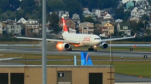 Terrifying Moment Swiss Air plane engine catches fire amid takeoff