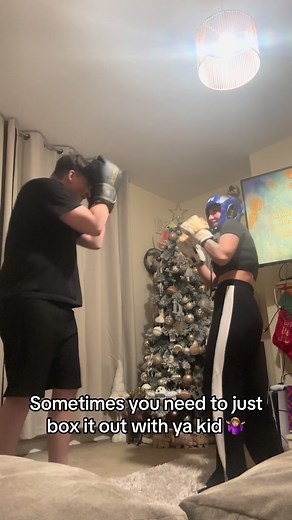 Engaging Mother-Son Boxing Moments