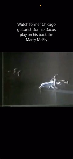 Watch former Chicago guitarist Donnie Dacus play on his back like Marty McFly #shorts #guitarsolo