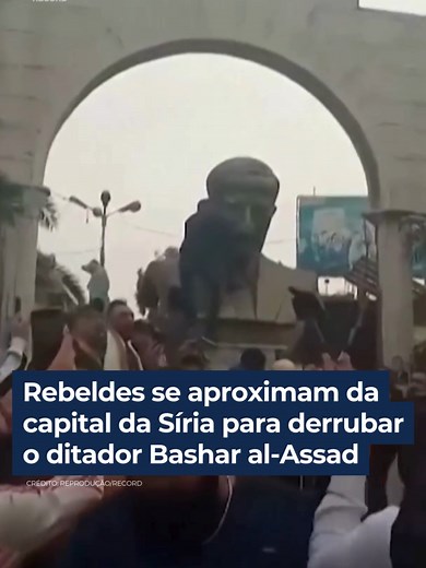 Queda da Estátua de Hafez al-Assad na Síria