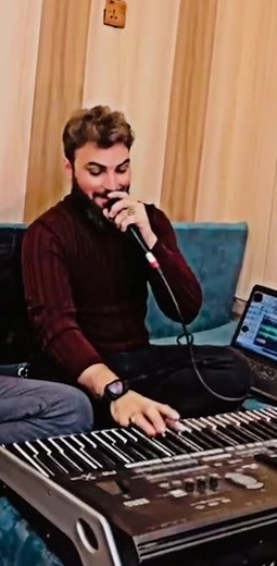 Musical Keyboard Performance with Laptop Setup