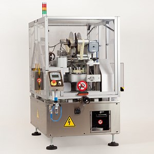 Tamper-evident labelling machine for pharmaceutical boxes