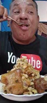 Gluttonous man eating beans with pig's trotter, ear, and knuckle